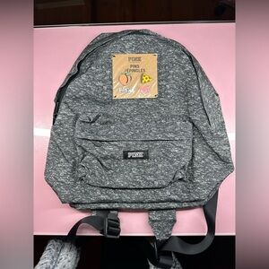 Pink backpack with pins